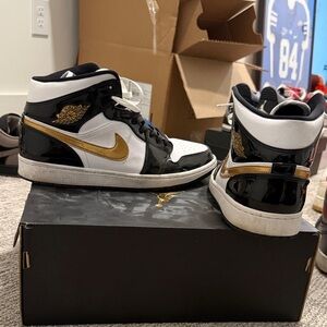 Nike Air Jordan 1 Mid Black and Gold
